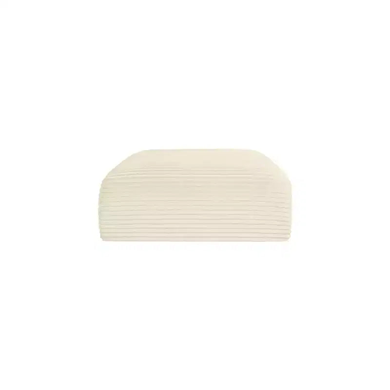 Pouf in tessuto performante a coste shaggy